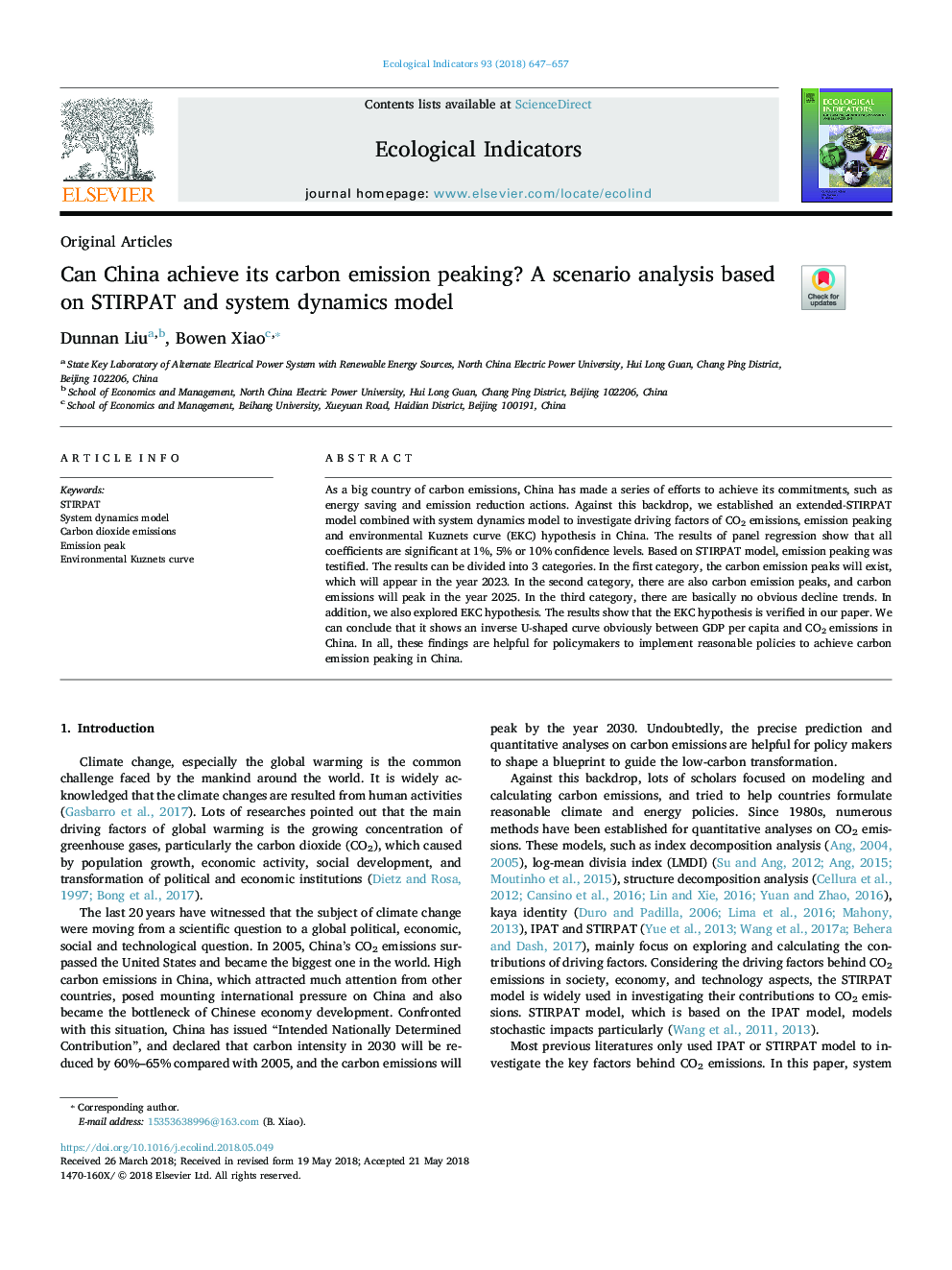 Can China achieve its carbon emission peaking? A scenario analysis based on STIRPAT and system dynamics model