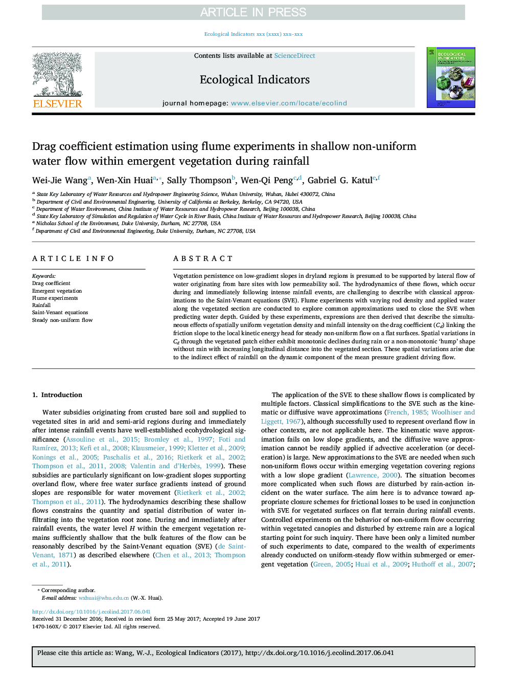 Drag coefficient estimation using flume experiments in shallow non-uniform water flow within emergent vegetation during rainfall