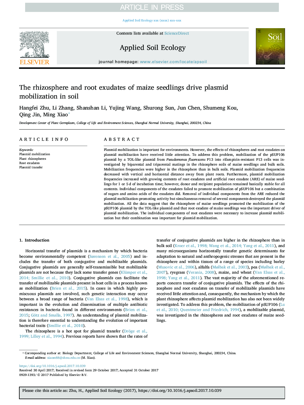 The rhizosphere and root exudates of maize seedlings drive plasmid mobilization in soil