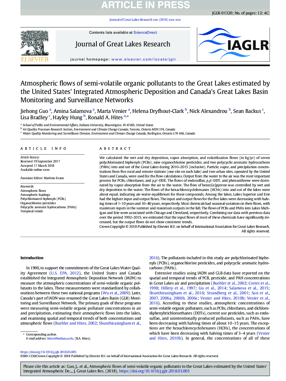 Atmospheric flows of semi-volatile organic pollutants to the Great Lakes estimated by the United States' Integrated Atmospheric Deposition and Canada's Great Lakes Basin Monitoring and Surveillance Networks