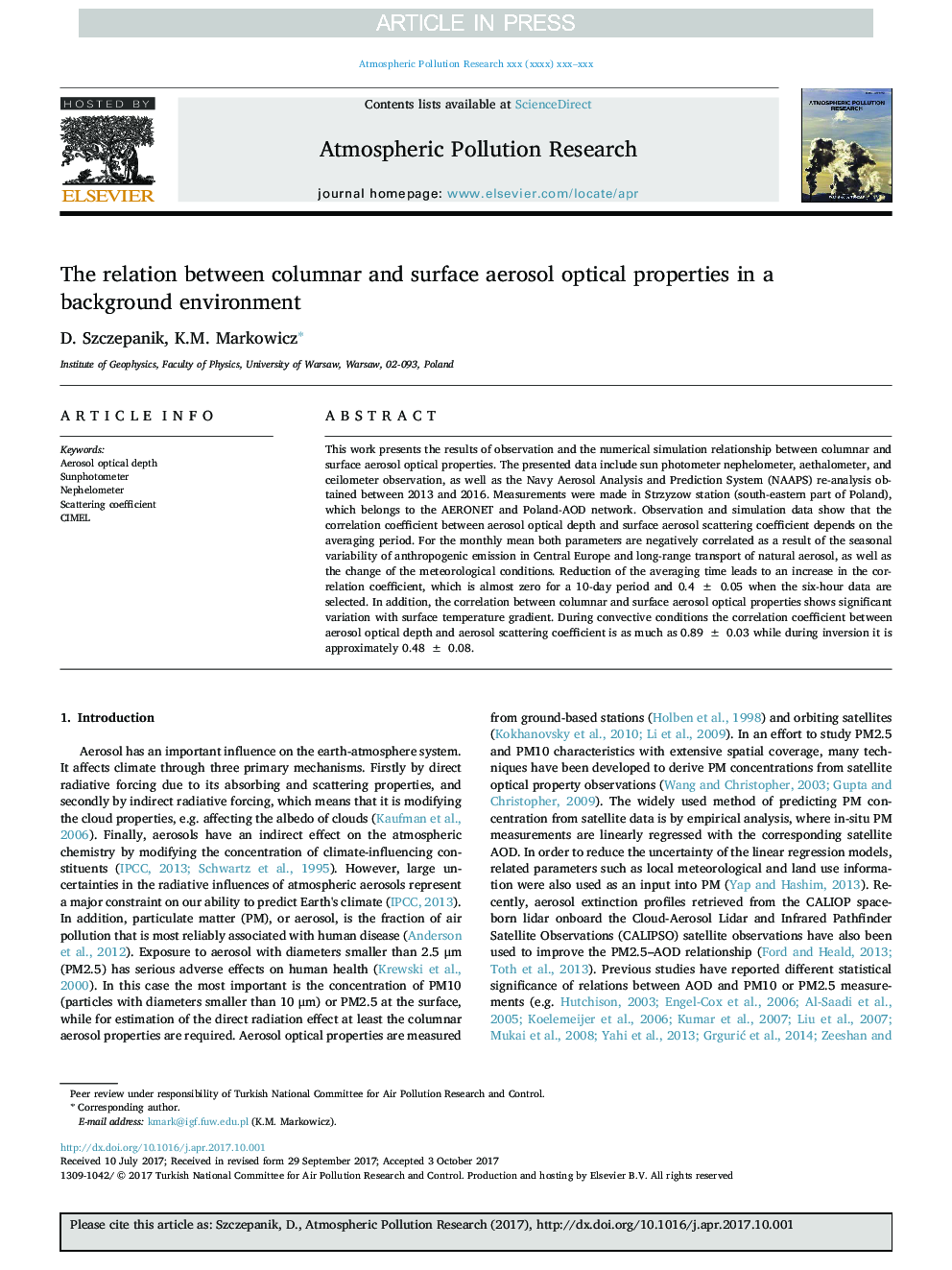 The relation between columnar and surface aerosol optical properties in a background environment