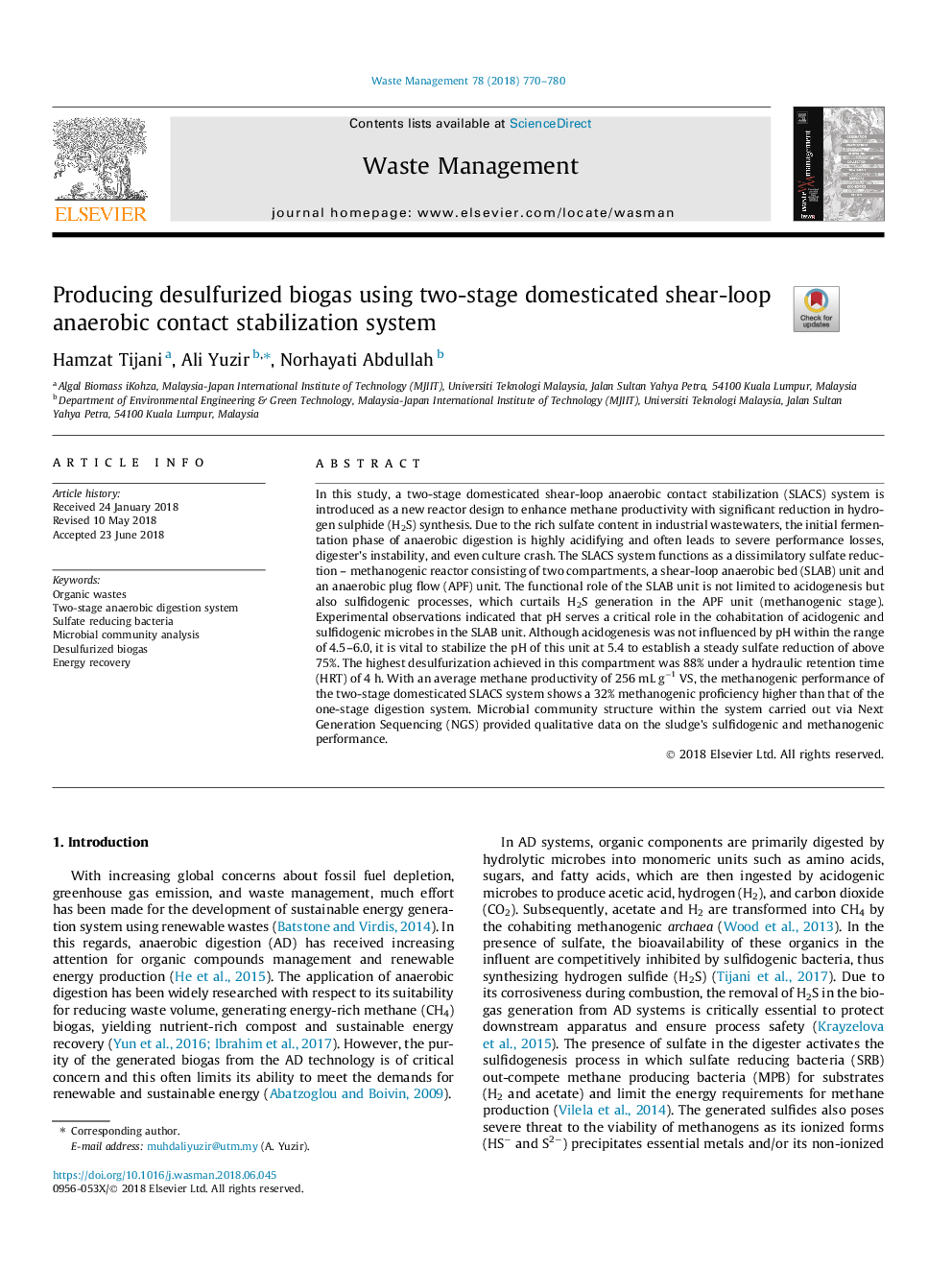 Producing desulfurized biogas using two-stage domesticated shear-loop anaerobic contact stabilization system