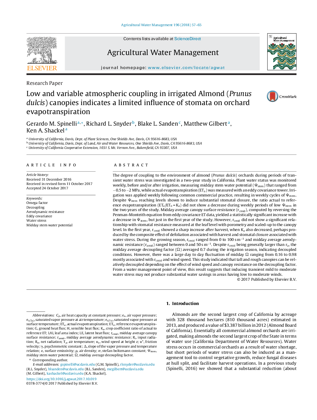 Low and variable atmospheric coupling in irrigated Almond (Prunus dulcis) canopies indicates a limited influence of stomata on orchard evapotranspiration