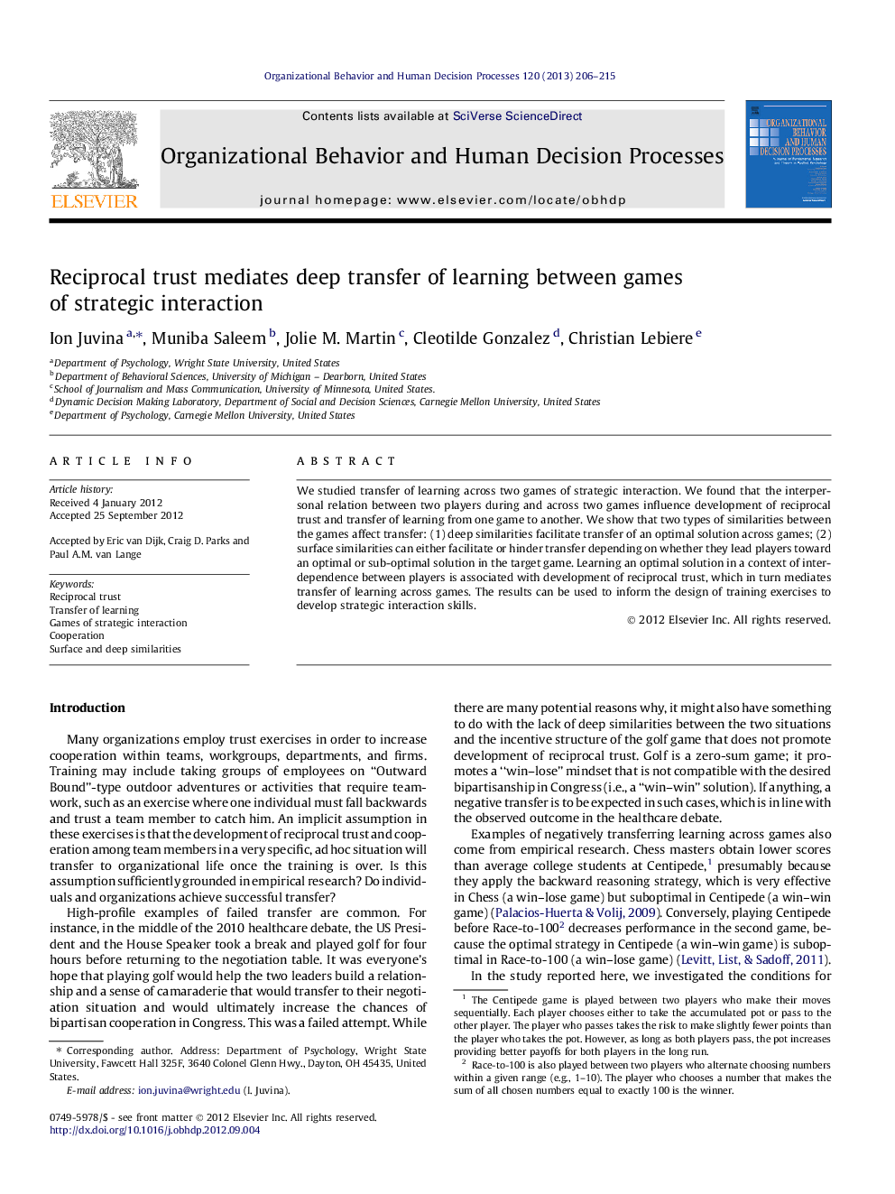 Reciprocal trust mediates deep transfer of learning between games of strategic interaction