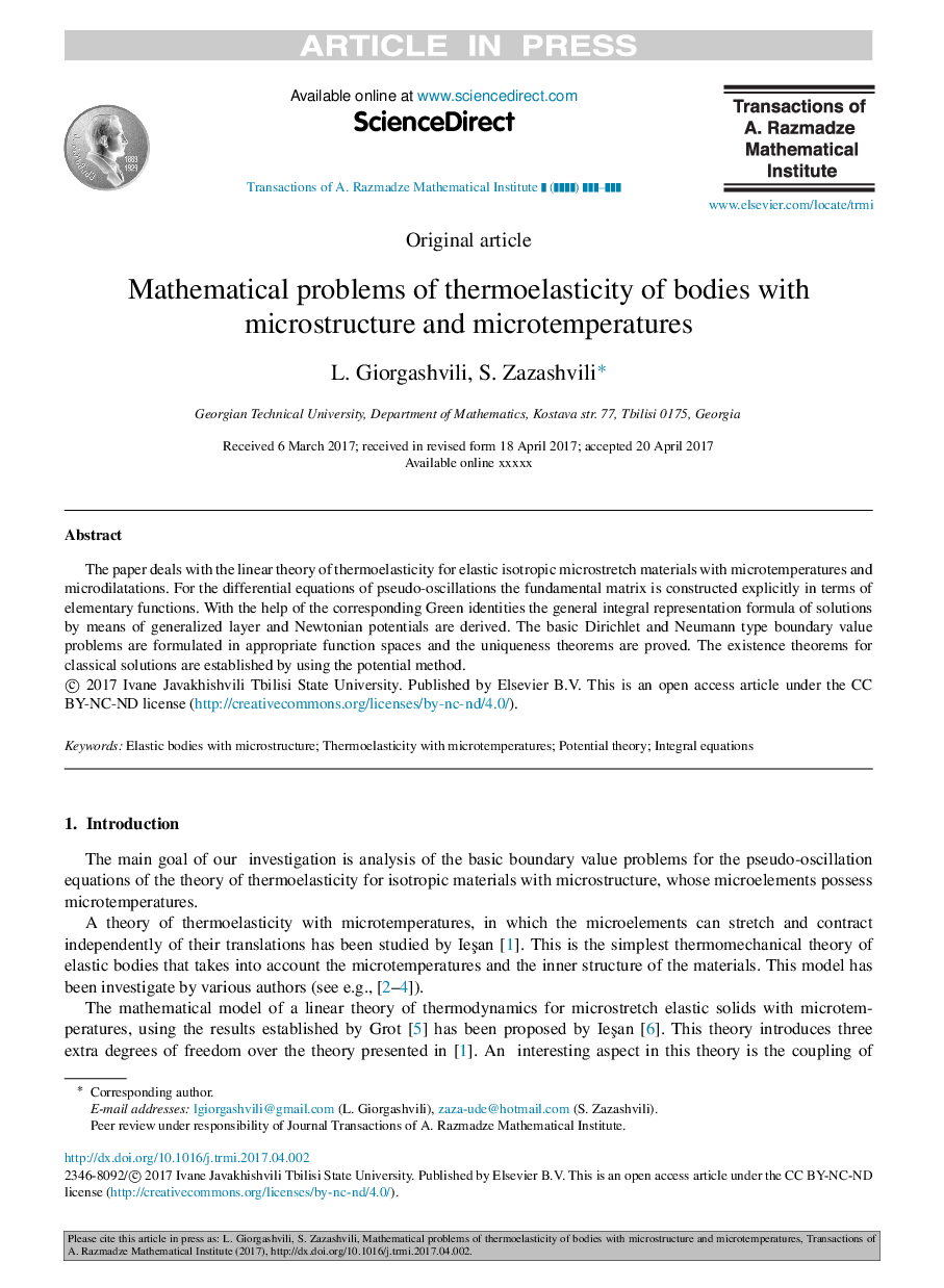 Mathematical problems of thermoelasticity of bodies with microstructure and microtemperatures