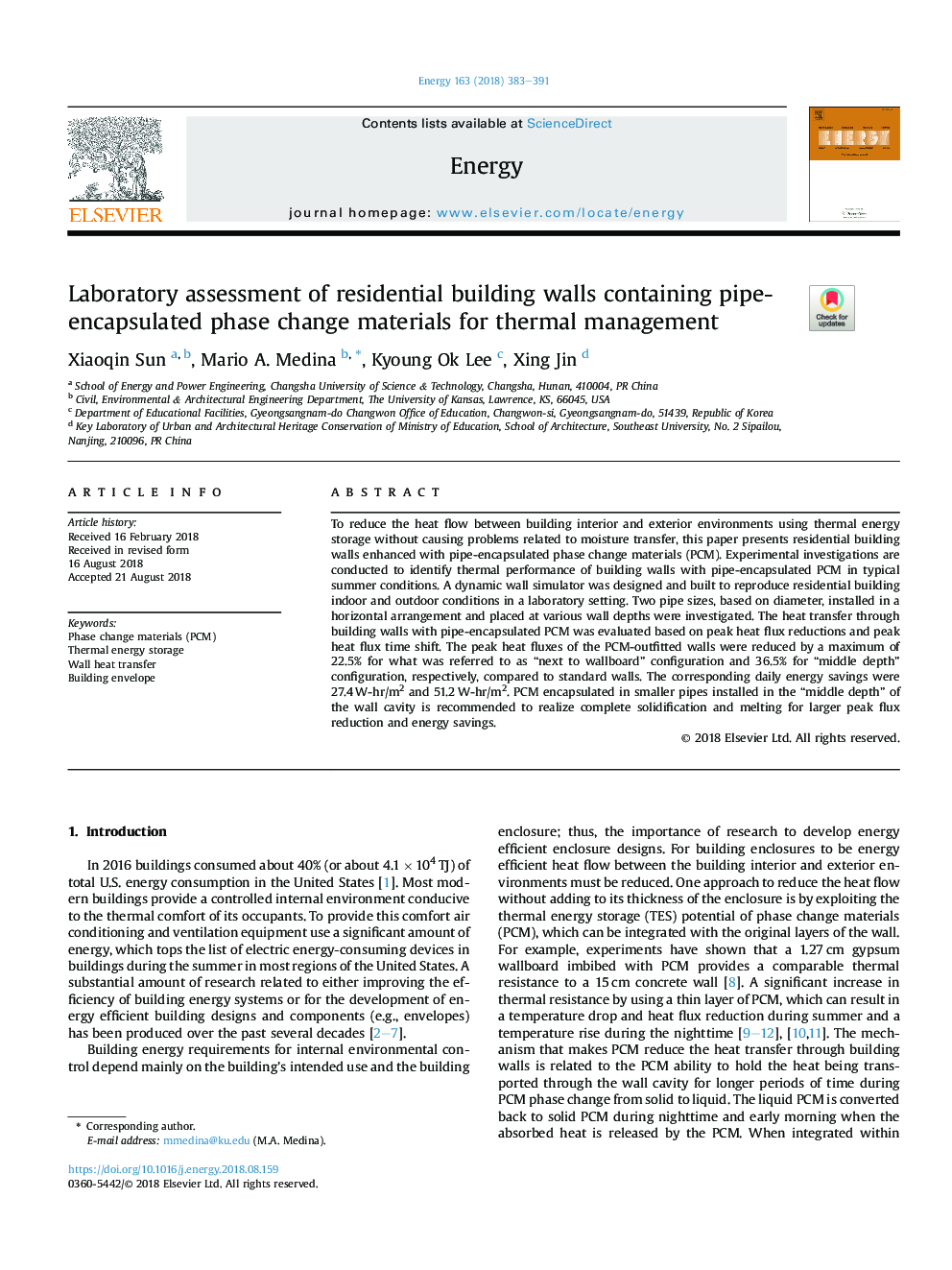 Laboratory assessment of residential building walls containing pipe-encapsulated phase change materials for thermal management