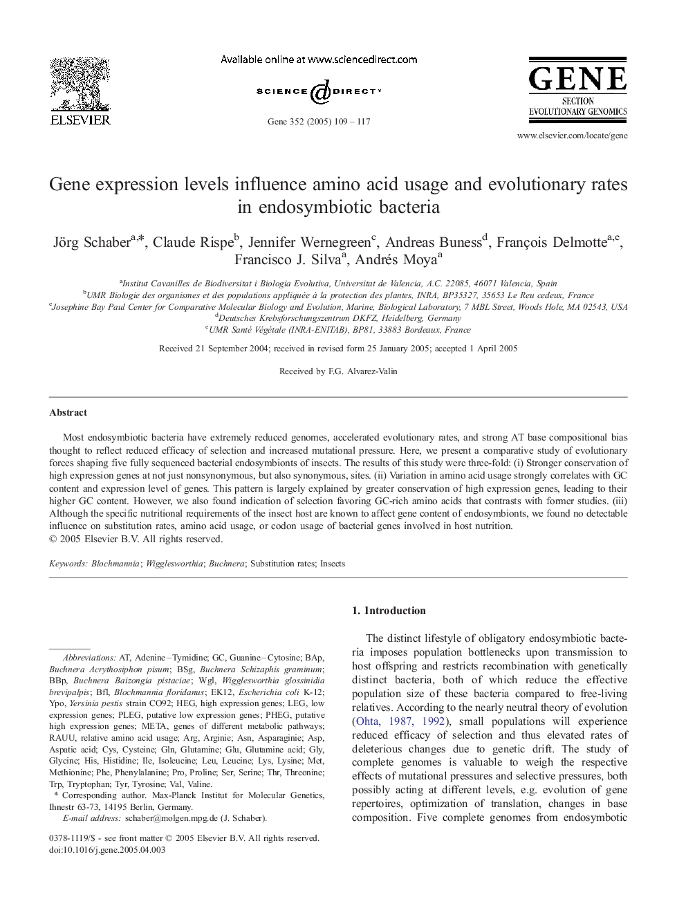 Gene expression levels influence amino acid usage and evolutionary rates in endosymbiotic bacteria