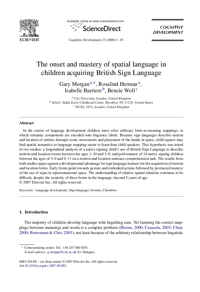 The onset and mastery of spatial language in children acquiring British Sign Language