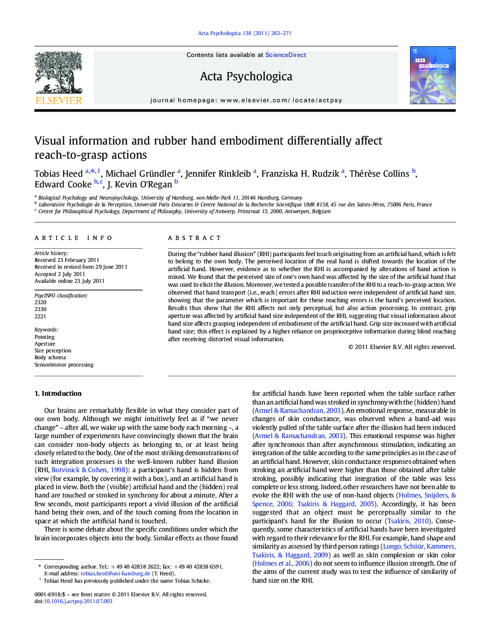 Visual information and rubber hand embodiment differentially affect reach-to-grasp actions