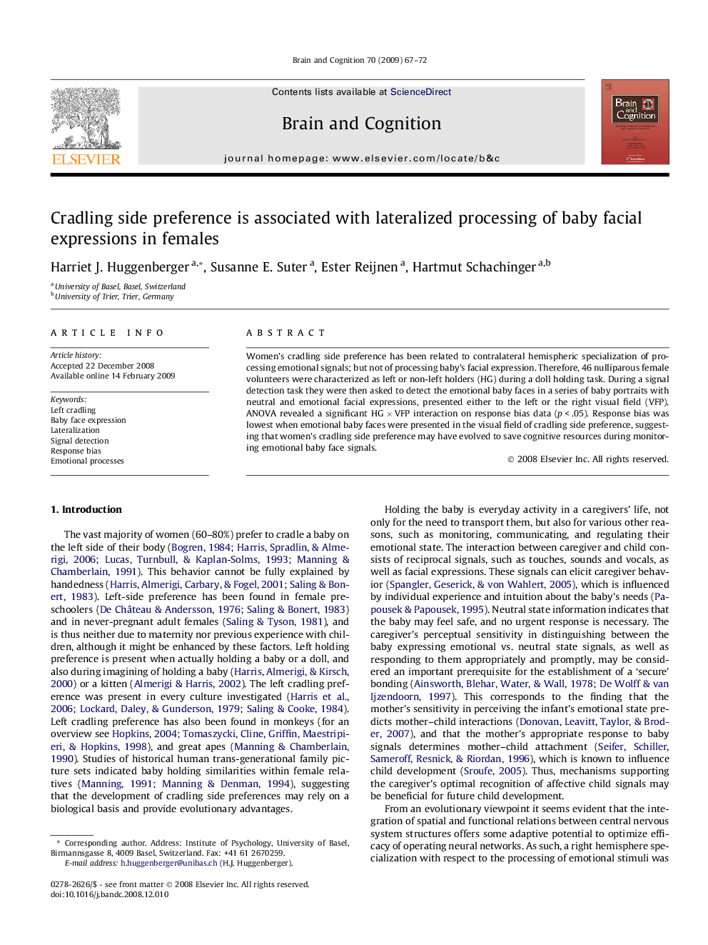 Cradling side preference is associated with lateralized processing of baby facial expressions in females