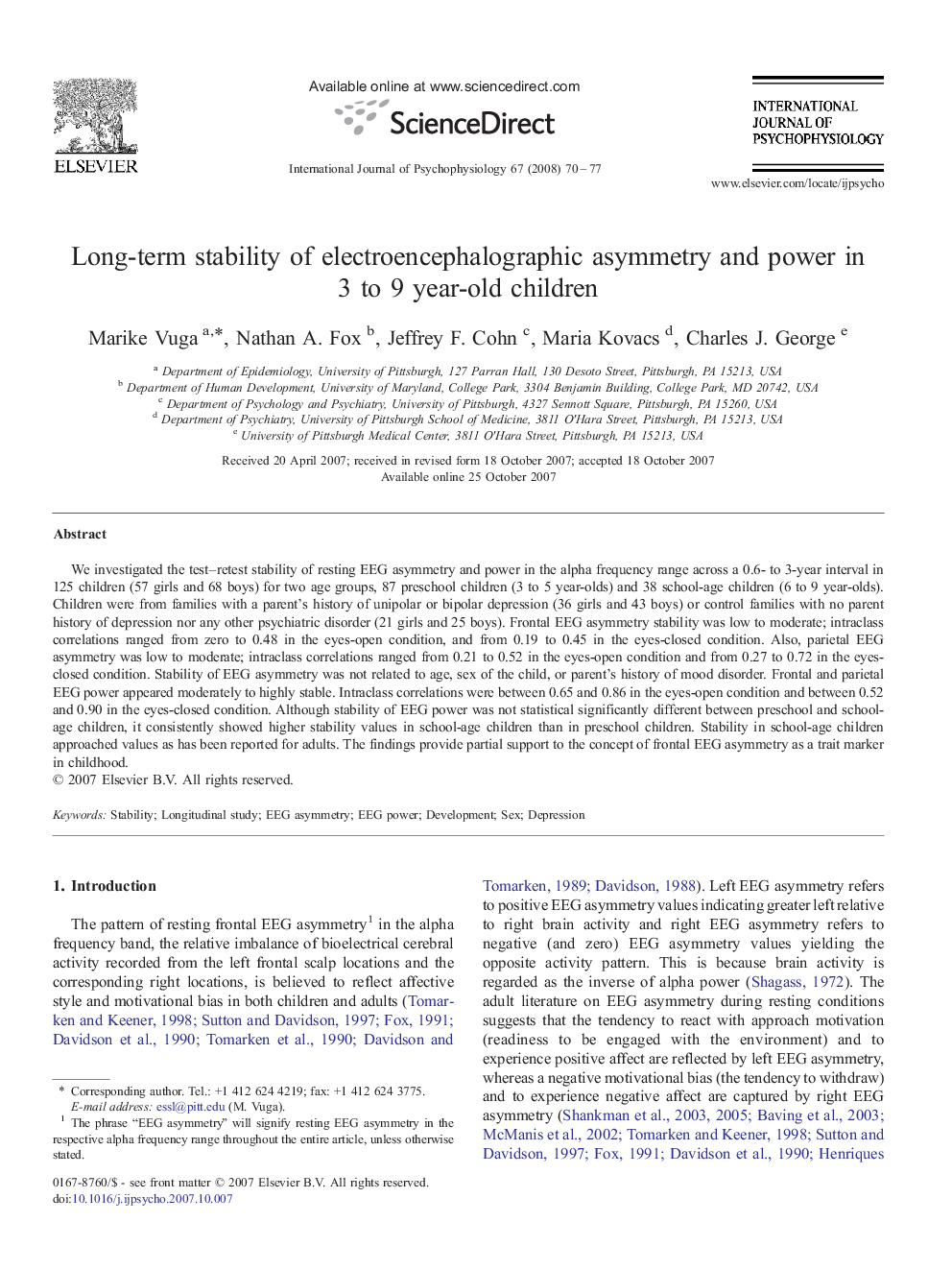 Long-term stability of electroencephalographic asymmetry and power in 3 to 9 year-old children