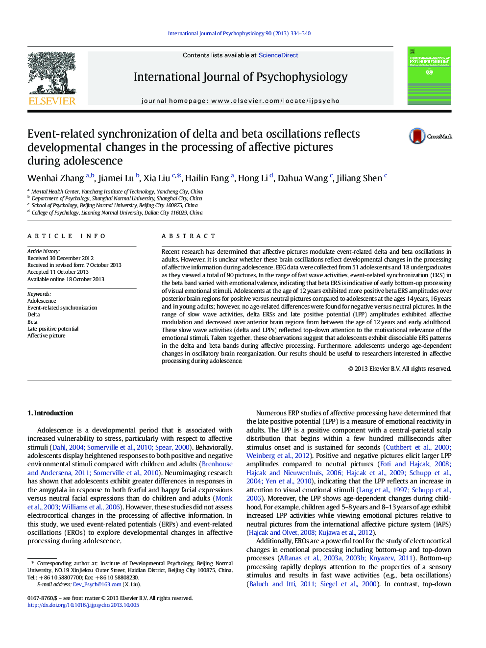 Event-related synchronization of delta and beta oscillations reflects developmental changes in the processing of affective pictures during adolescence