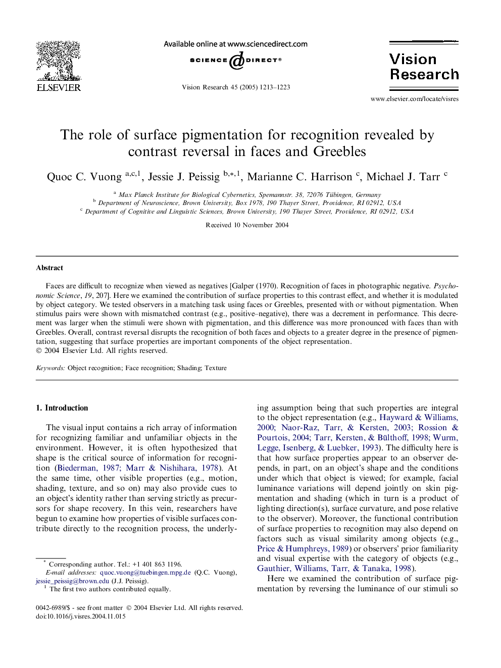 The role of surface pigmentation for recognition revealed by contrast reversal in faces and Greebles