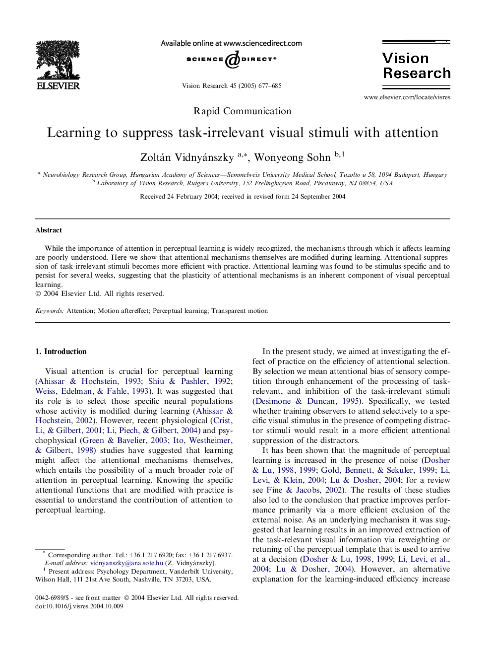 Learning to suppress task-irrelevant visual stimuli with attention