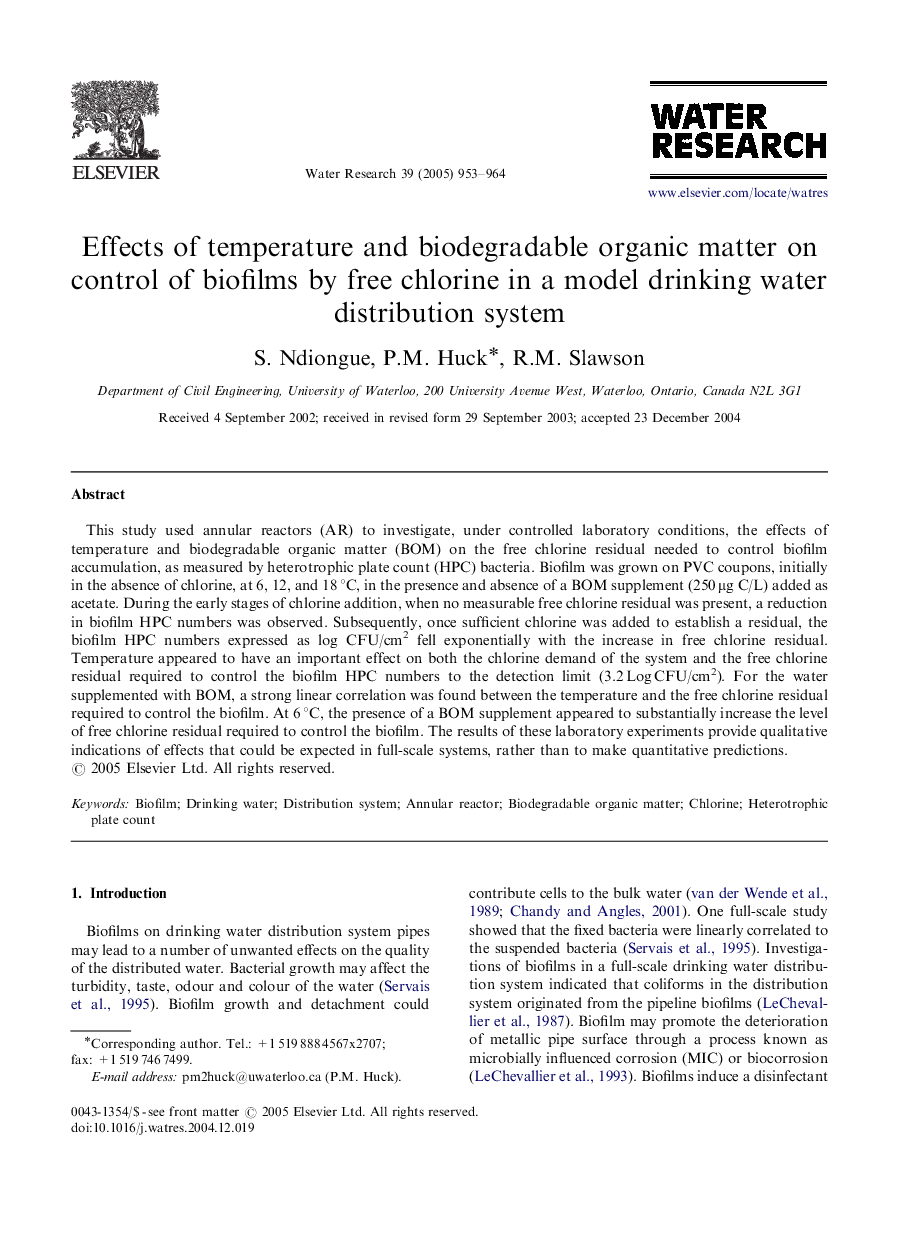 Effects of temperature and biodegradable organic matter on control of biofilms by free chlorine in a model drinking water distribution system