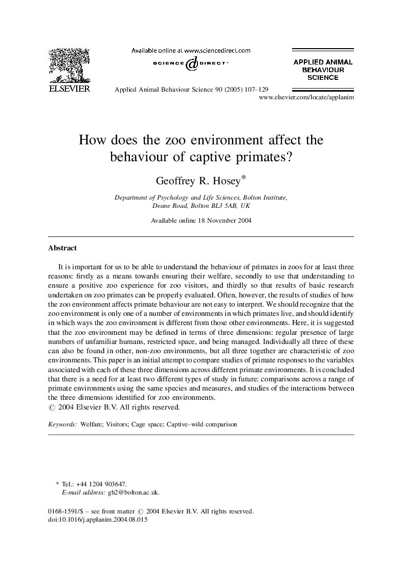 How does the zoo environment affect the behaviour of captive primates?