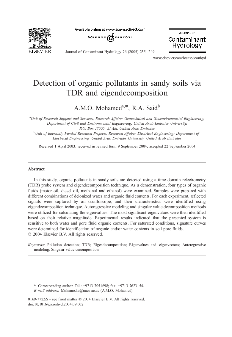 Detection of organic pollutants in sandy soils via TDR and eigendecomposition