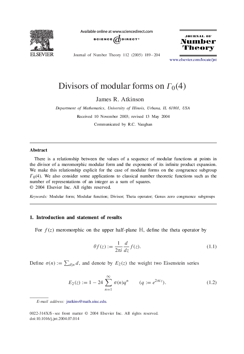 Divisors of modular forms on Î0(4)