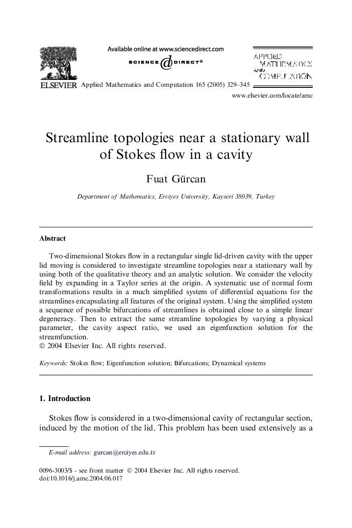 Streamline topologies near a stationary wall of Stokes flow in a cavity