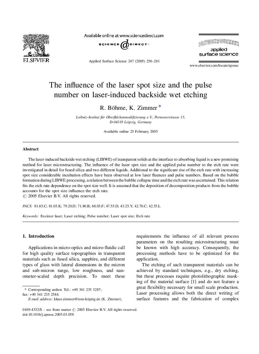 The influence of the laser spot size and the pulse number on laser-induced backside wet etching