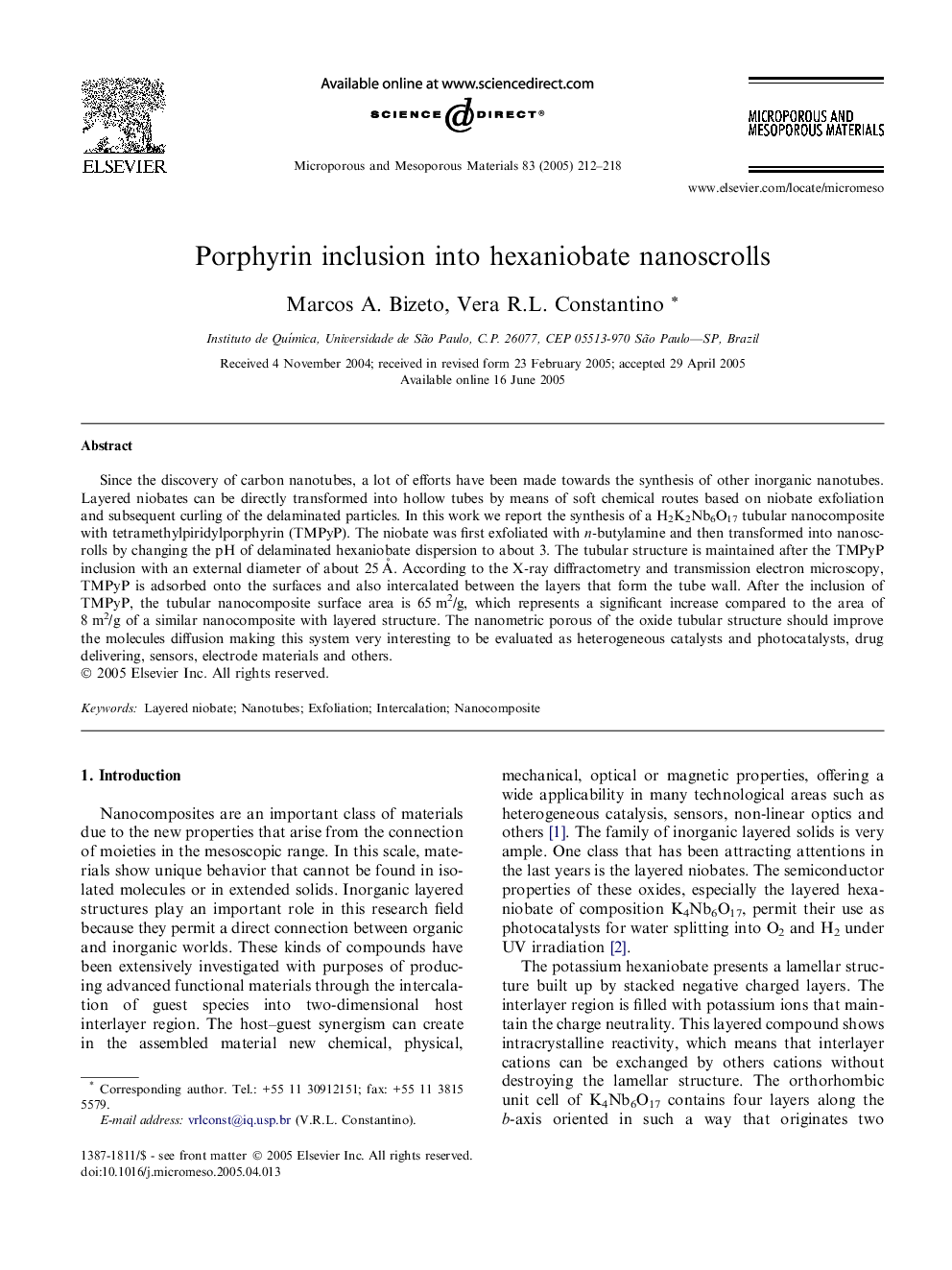 Porphyrin inclusion into hexaniobate nanoscrolls