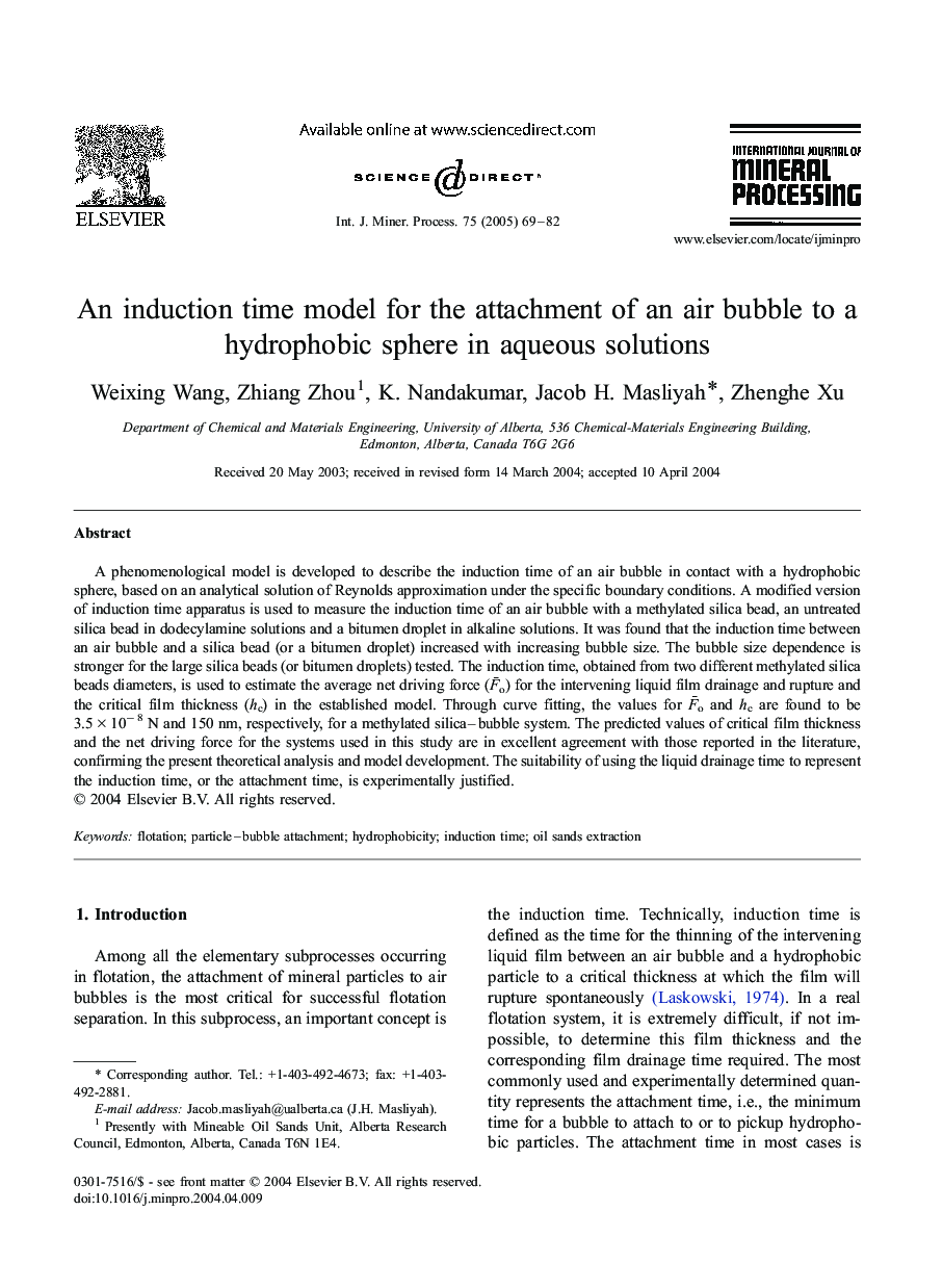 An induction time model for the attachment of an air bubble to a hydrophobic sphere in aqueous solutions