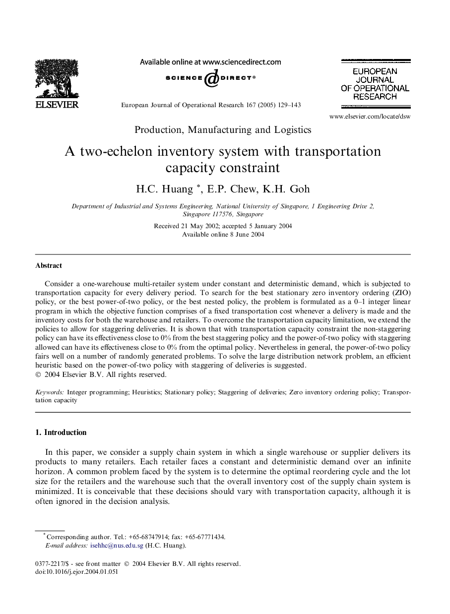 A two-echelon inventory system with transportation capacity constraint