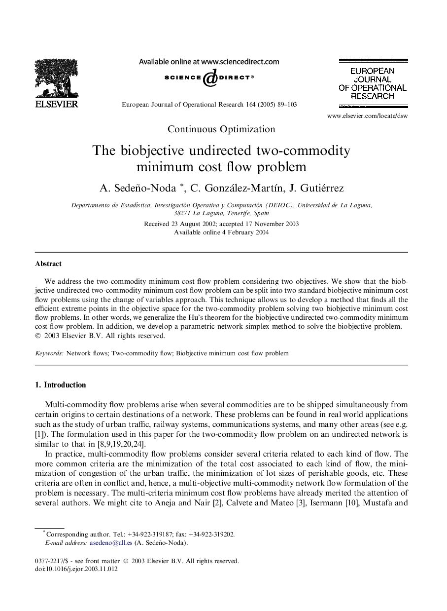 The biobjective undirected two-commodity minimum cost flow problem