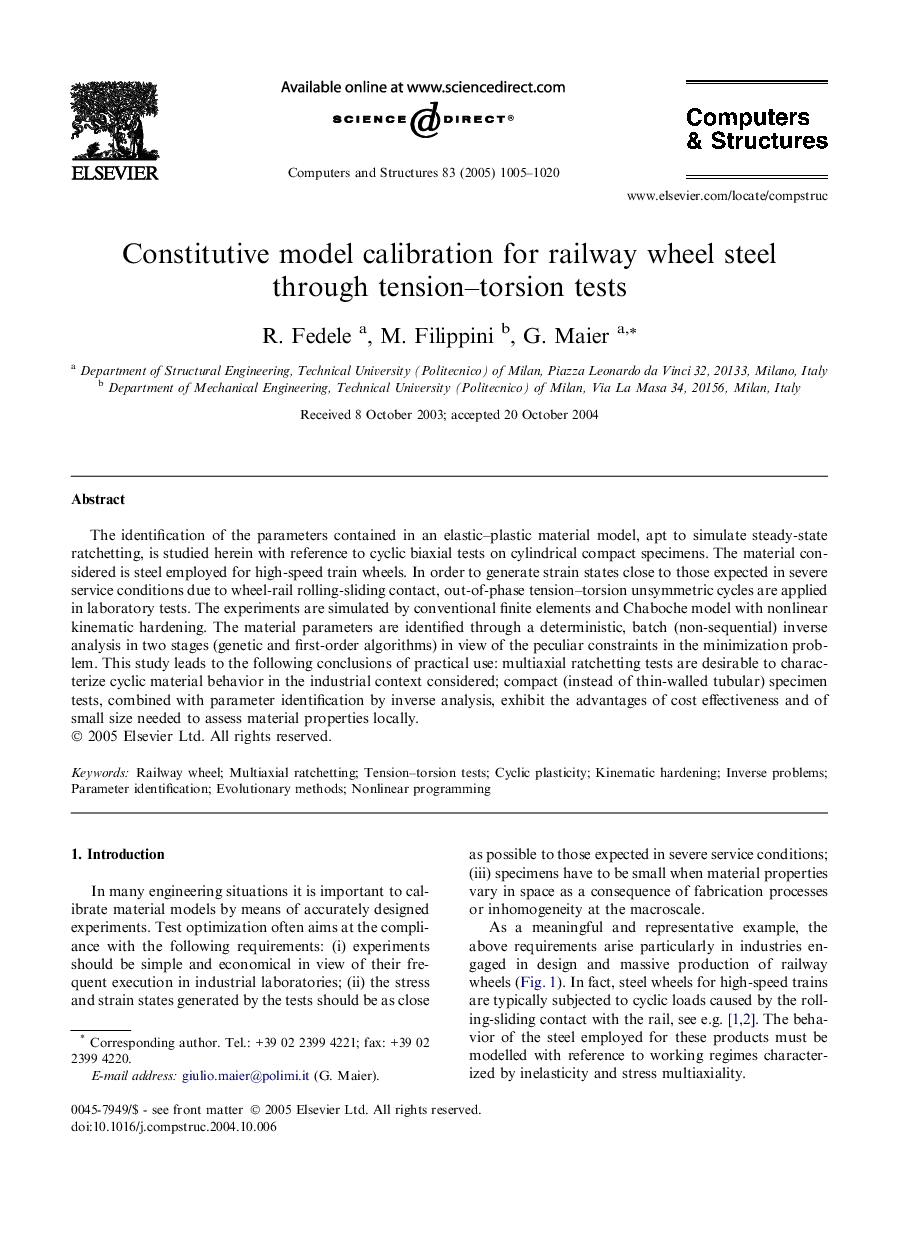 Constitutive model calibration for railway wheel steel through tension-torsion tests