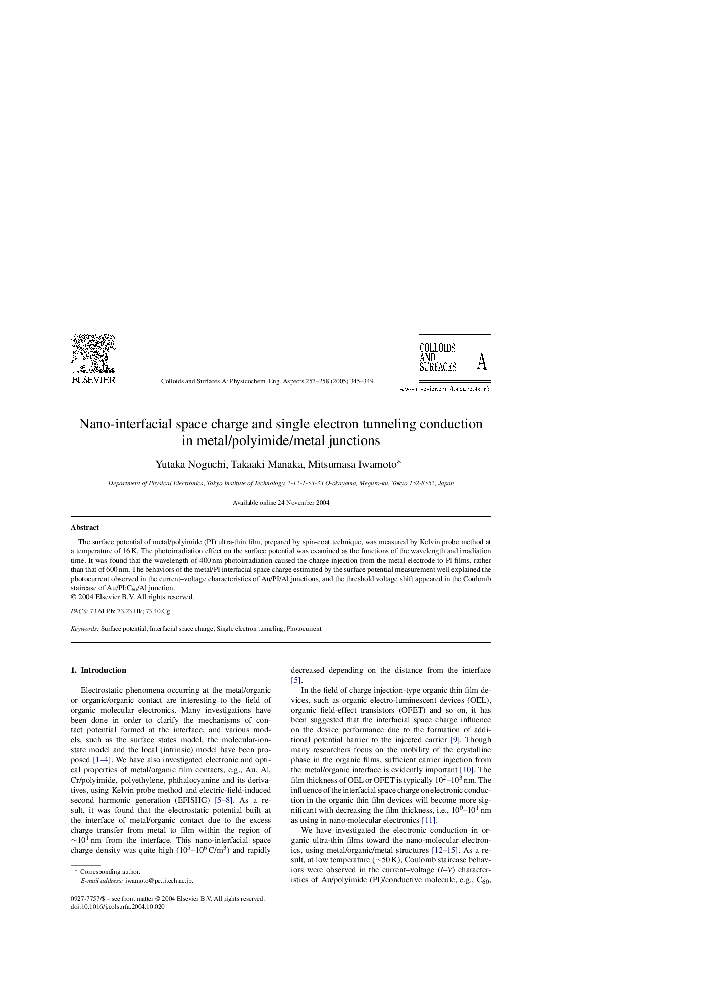 Nano-interfacial space charge and single electron tunneling conduction in metal/polyimide/metal junctions