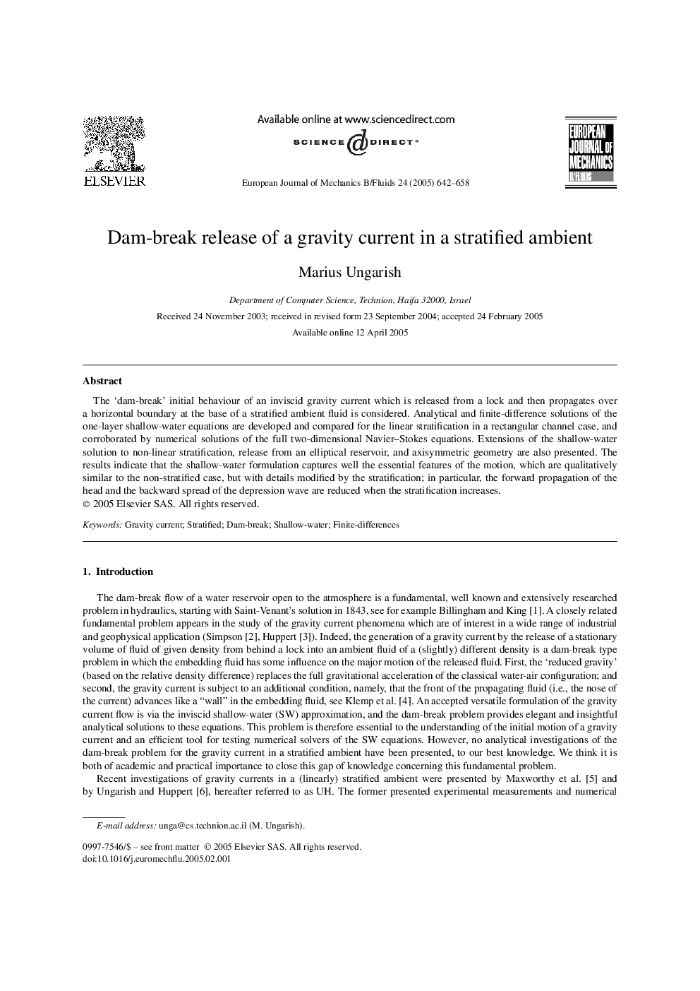 Dam-break release of a gravity current in a stratified ambient