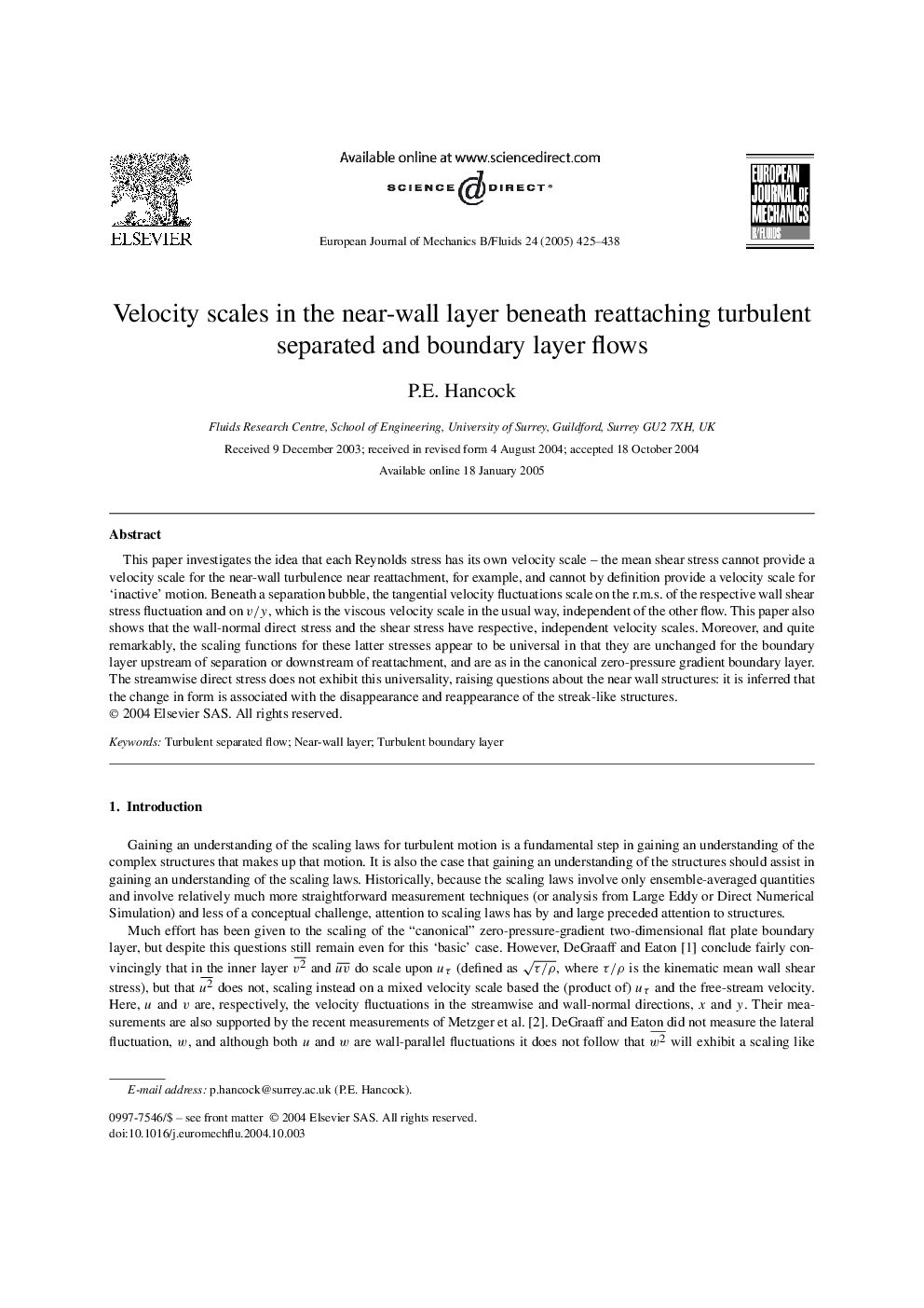 Velocity scales in the near-wall layer beneath reattaching turbulent separated and boundary layer flows