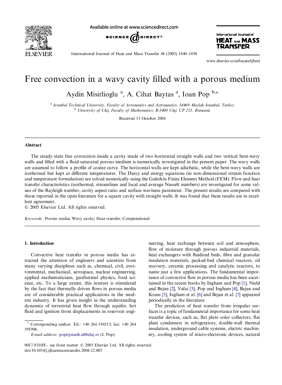 Free convection in a wavy cavity filled with a porous medium