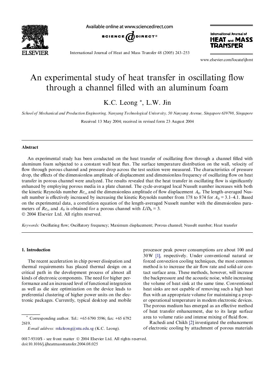 An experimental study of heat transfer in oscillating flow through a channel filled with an aluminum foam