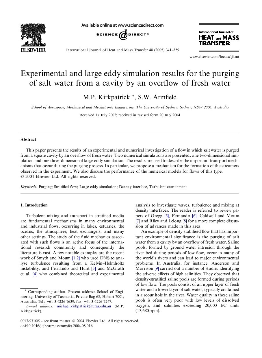 Experimental and large eddy simulation results for the purging of salt water from a cavity by an overflow of fresh water