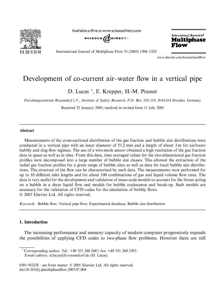 Development of co-current air-water flow in a vertical pipe