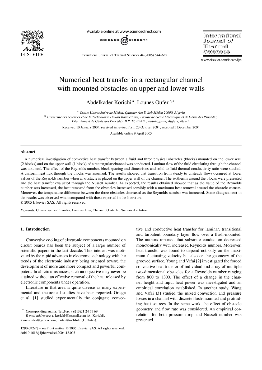 Numerical heat transfer in a rectangular channel with mounted obstacles on upper and lower walls