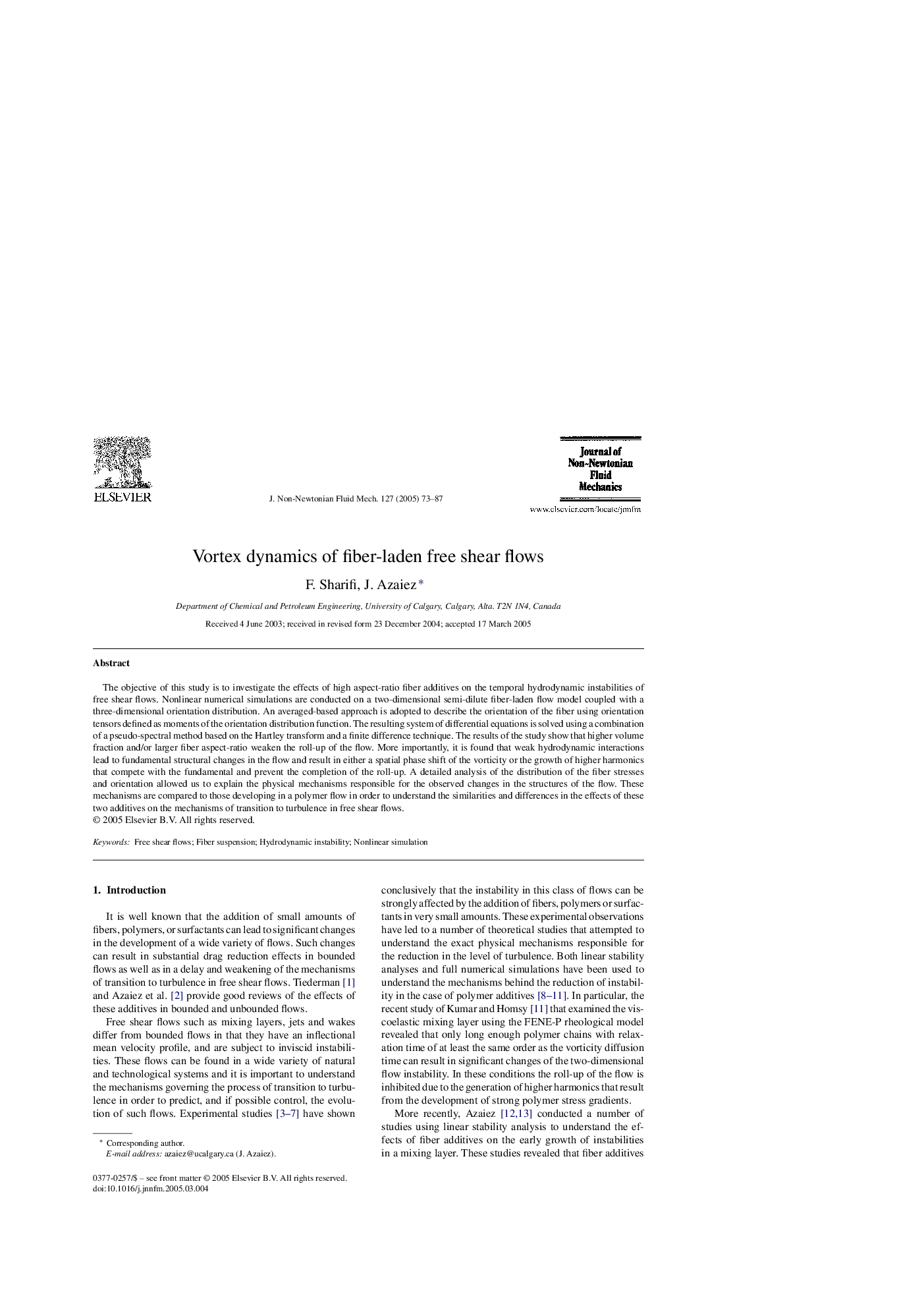 Vortex dynamics of fiber-laden free shear flows