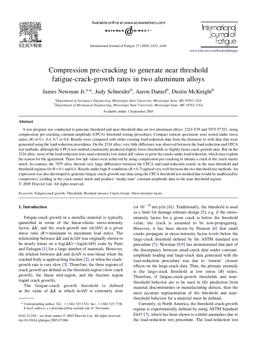 Compression pre-cracking to generate near threshold fatigue-crack-growth rates in two aluminum alloys