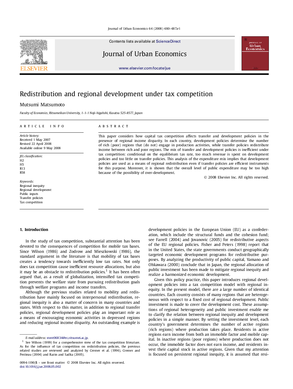 Redistribution and regional development under tax competition