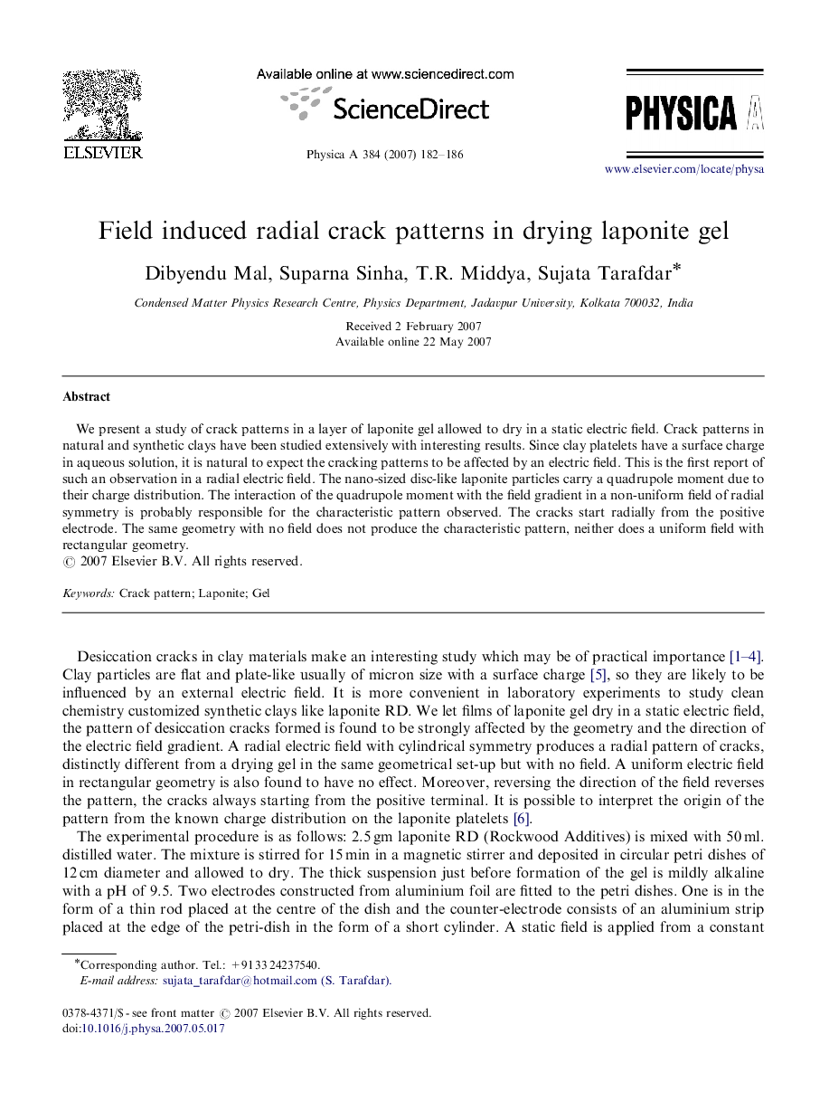 Field induced radial crack patterns in drying laponite gel