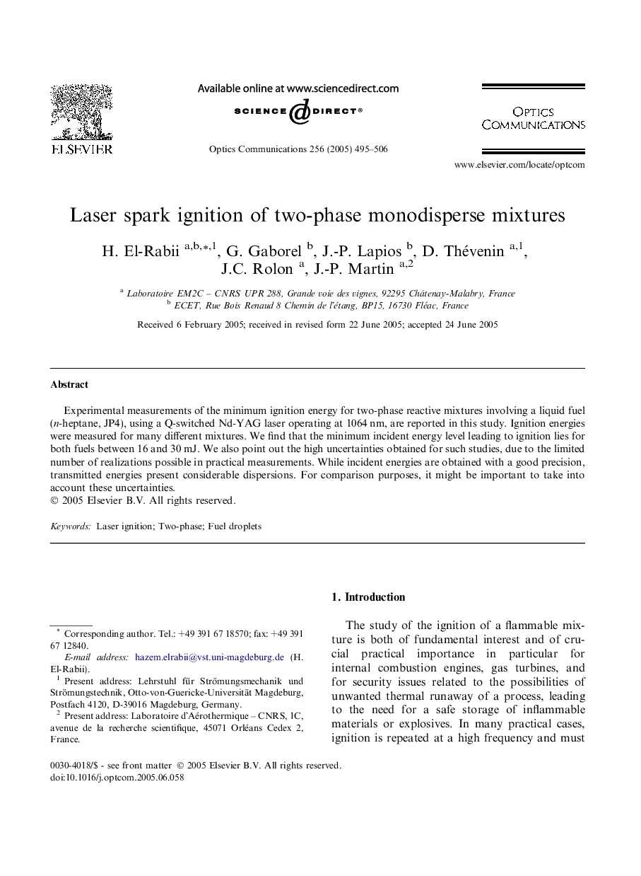 Laser spark ignition of two-phase monodisperse mixtures