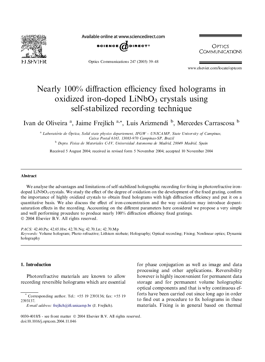 Nearly 100% diffraction efficiency fixed holograms in oxidized iron-doped LiNbO3 crystals using self-stabilized recording technique