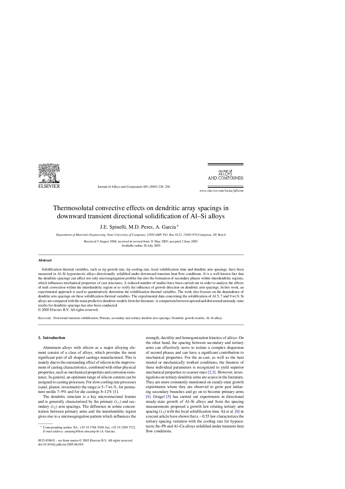 Thermosolutal convective effects on dendritic array spacings in downward transient directional solidification of Al-Si alloys