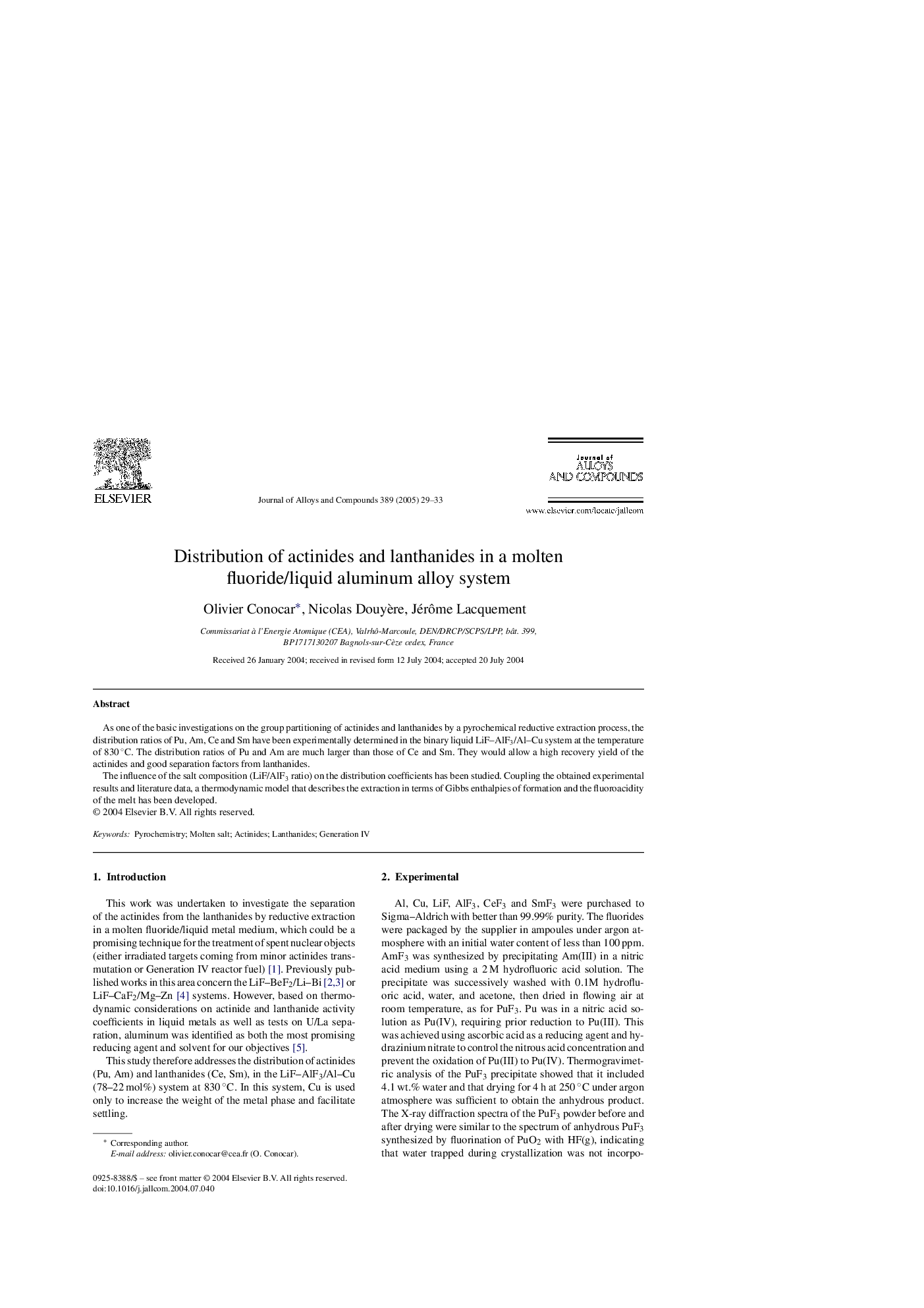 Distribution of actinides and lanthanides in a molten fluoride/liquid aluminum alloy system