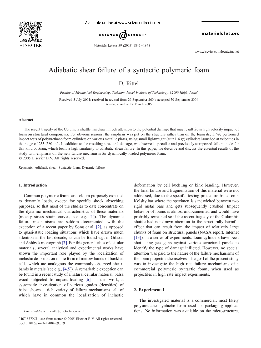 Adiabatic shear failure of a syntactic polymeric foam