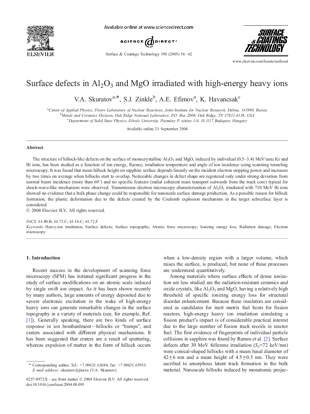 Surface defects in Al2O3 and MgO irradiated with high-energy heavy ions