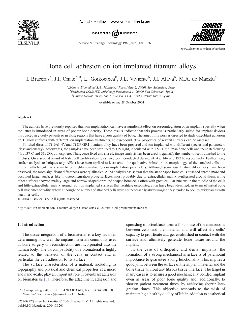 Bone cell adhesion on ion implanted titanium alloys