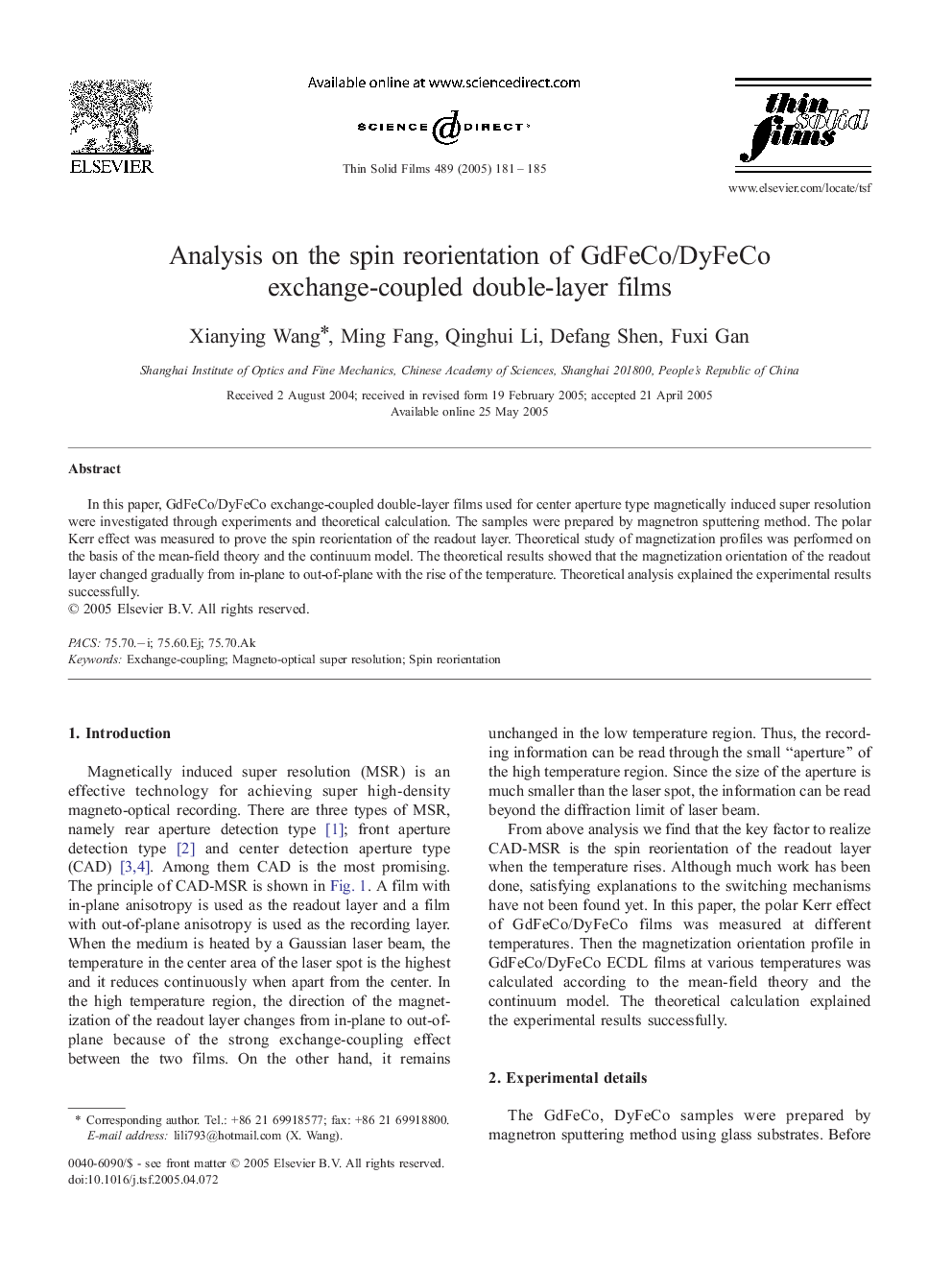 Analysis on the spin reorientation of GdFeCo/DyFeCo exchange-coupled double-layer films