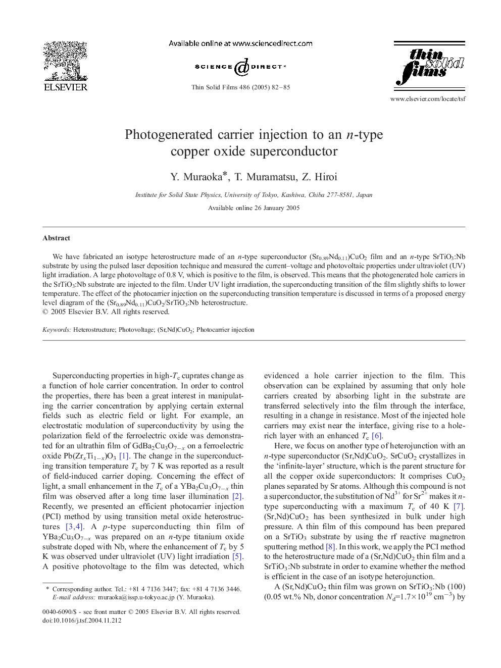 Photogenerated carrier injection to an n-type copper oxide superconductor